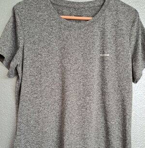 Reebok round neck, he as heather gray, 100% polyester, rib to rib 21"  arm 7"